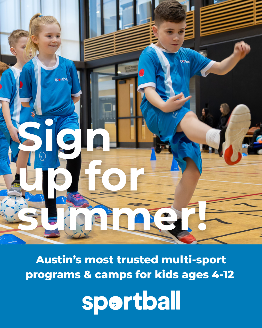 Kids in Sportball jerseys playing indoor soccer